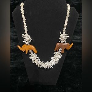 Chunky white seashell with wood carved elephant and rhino necklace